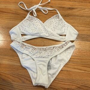 Victoria’s Secret white criss Cross top with rouched bottom with gold sequins